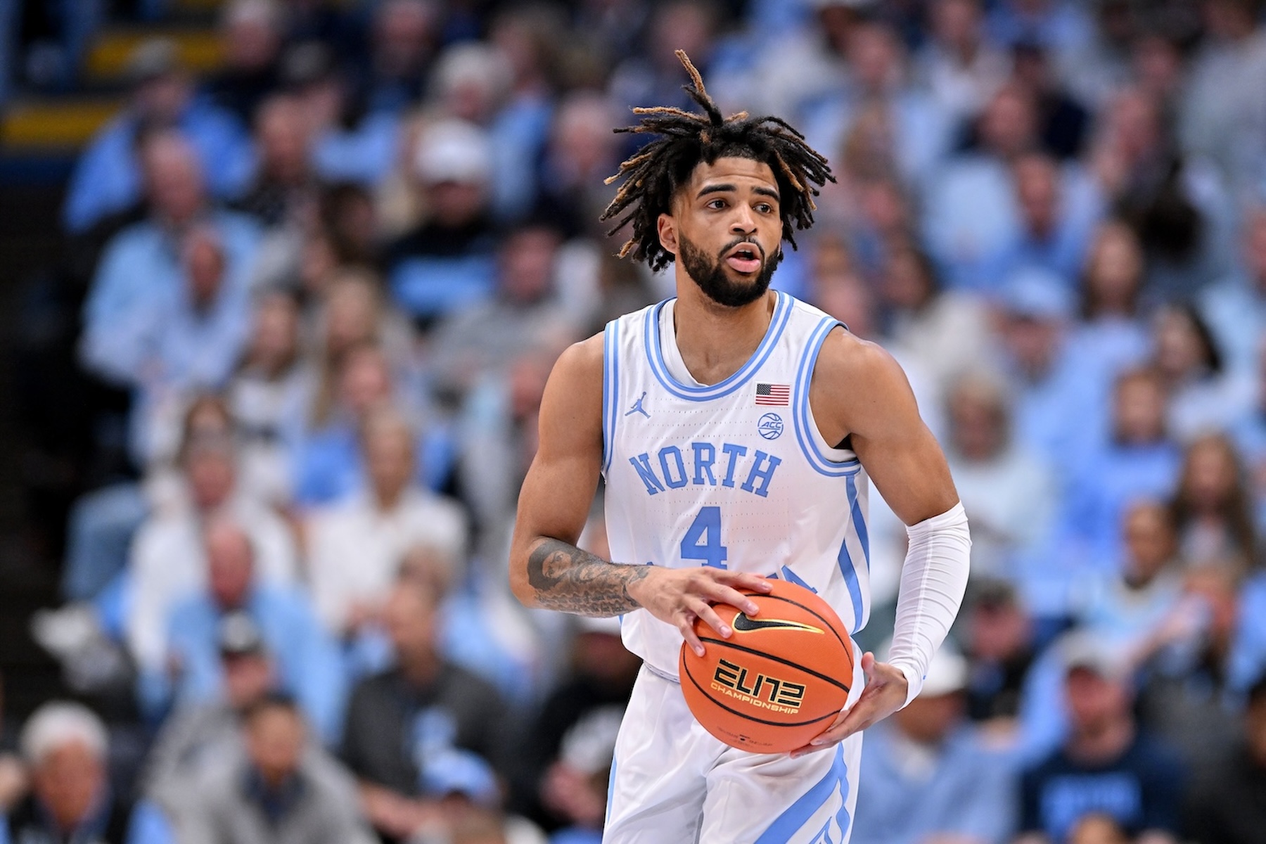 RJ Davis, North Carolina Tar Heels guard, moves the ball against the Syracuse Orangemen.
