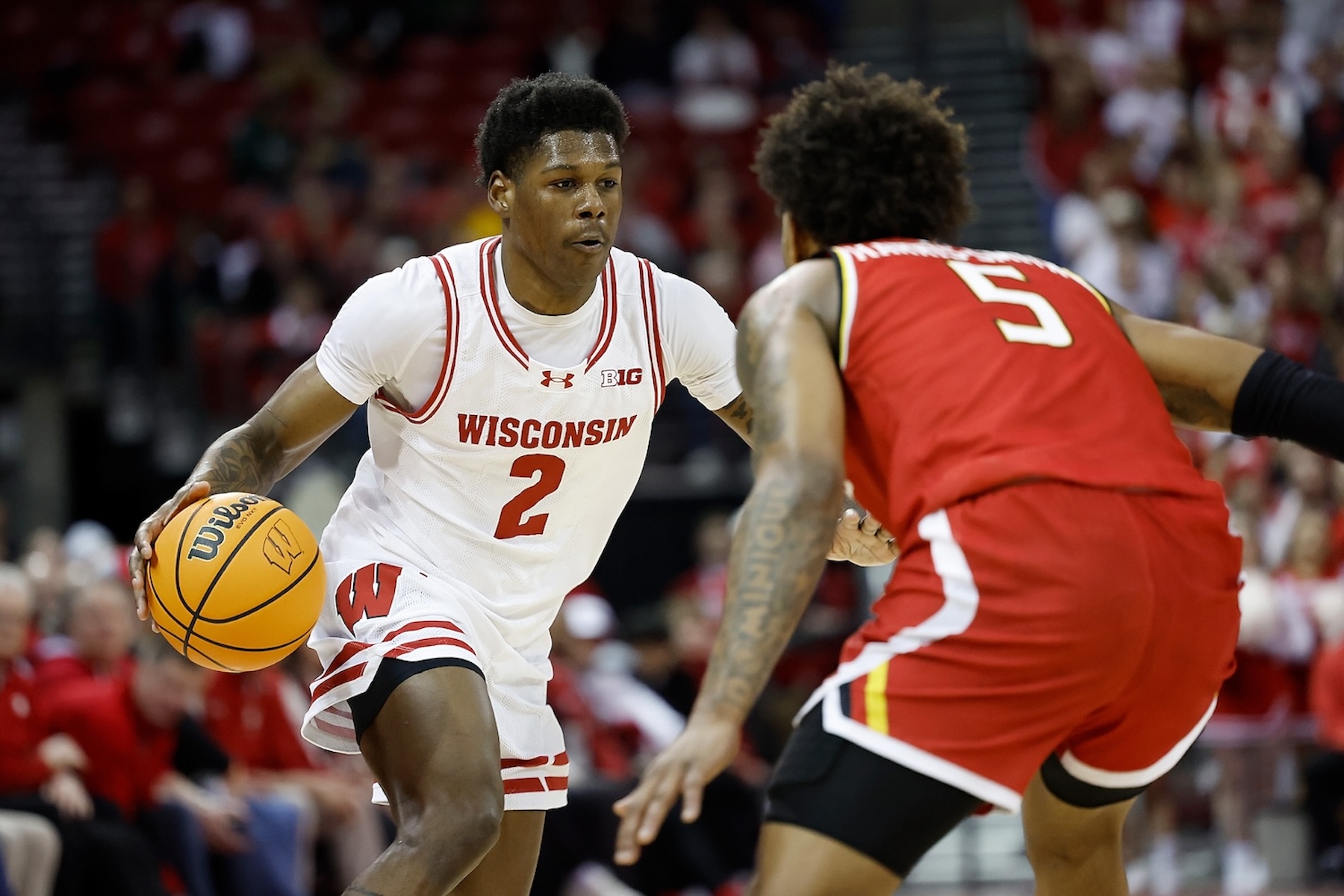 AJ Storr, now at the University of Kanas, plays for the Wisconsin Badgers in February 2024.