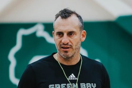 Green Bay basketball coach Doug Gottlieb on the sideline