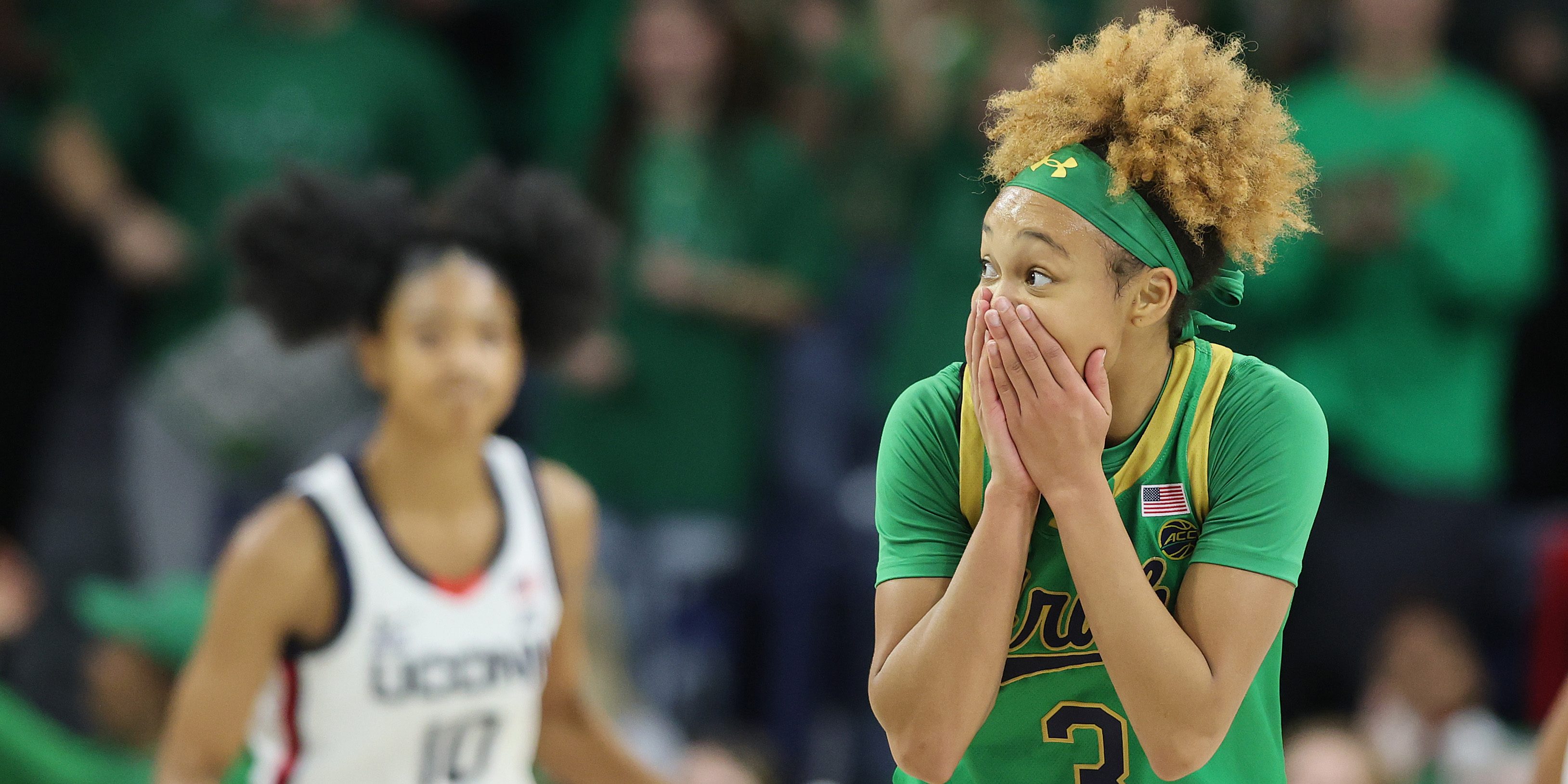 Hannah Hidalgo #3 of the Notre Dame Fighting Irish celebrates a three pointer by Liatu King #20 (not pictured) against the UConn Huskies during the first half at Purcell Pavilion at the Joyce Center on December 12, 2024 in South Bend, Indiana.
