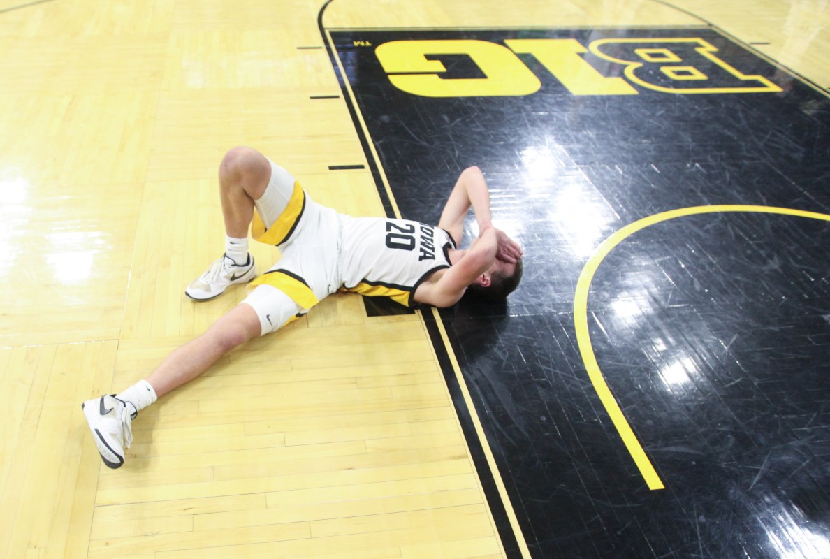 Senior forward, Payton Sandfort hits the floor after a devastating 78-80 loss to Oregon on Wednesday