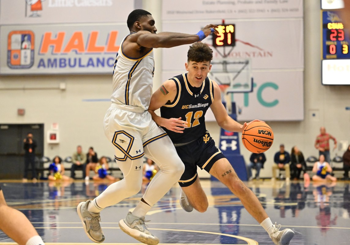 UC San Diego Tritons guard Aniwaniwa Tait-Jones drives the ball