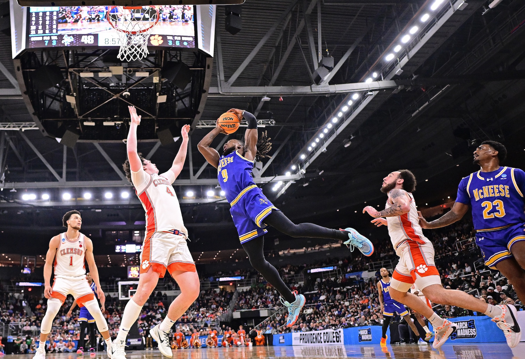 Bryant Selebangue #9 of the McNeese Cowboys drives to the basket
