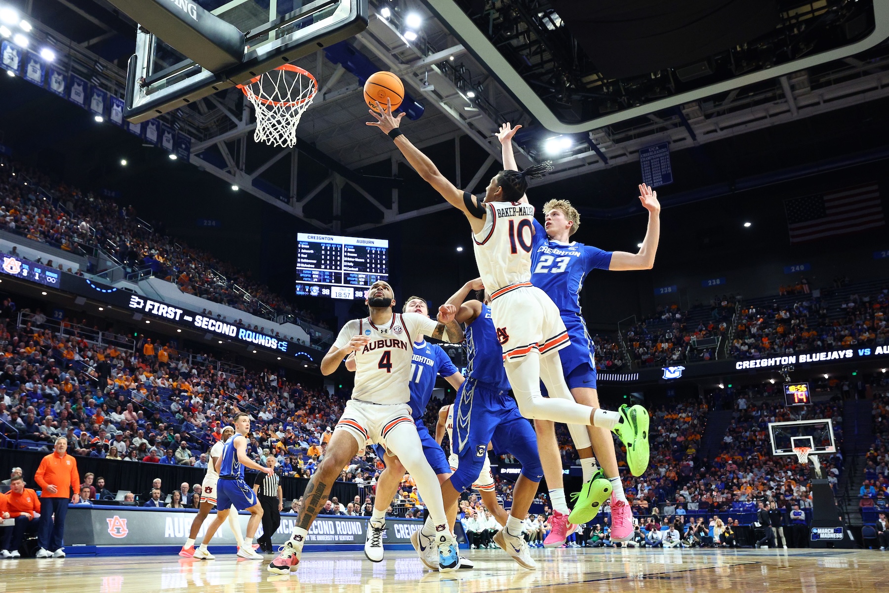 Chad Baker-Mazara #10 of the Auburn Tigers takes a shot against Jackson McAndrew #23