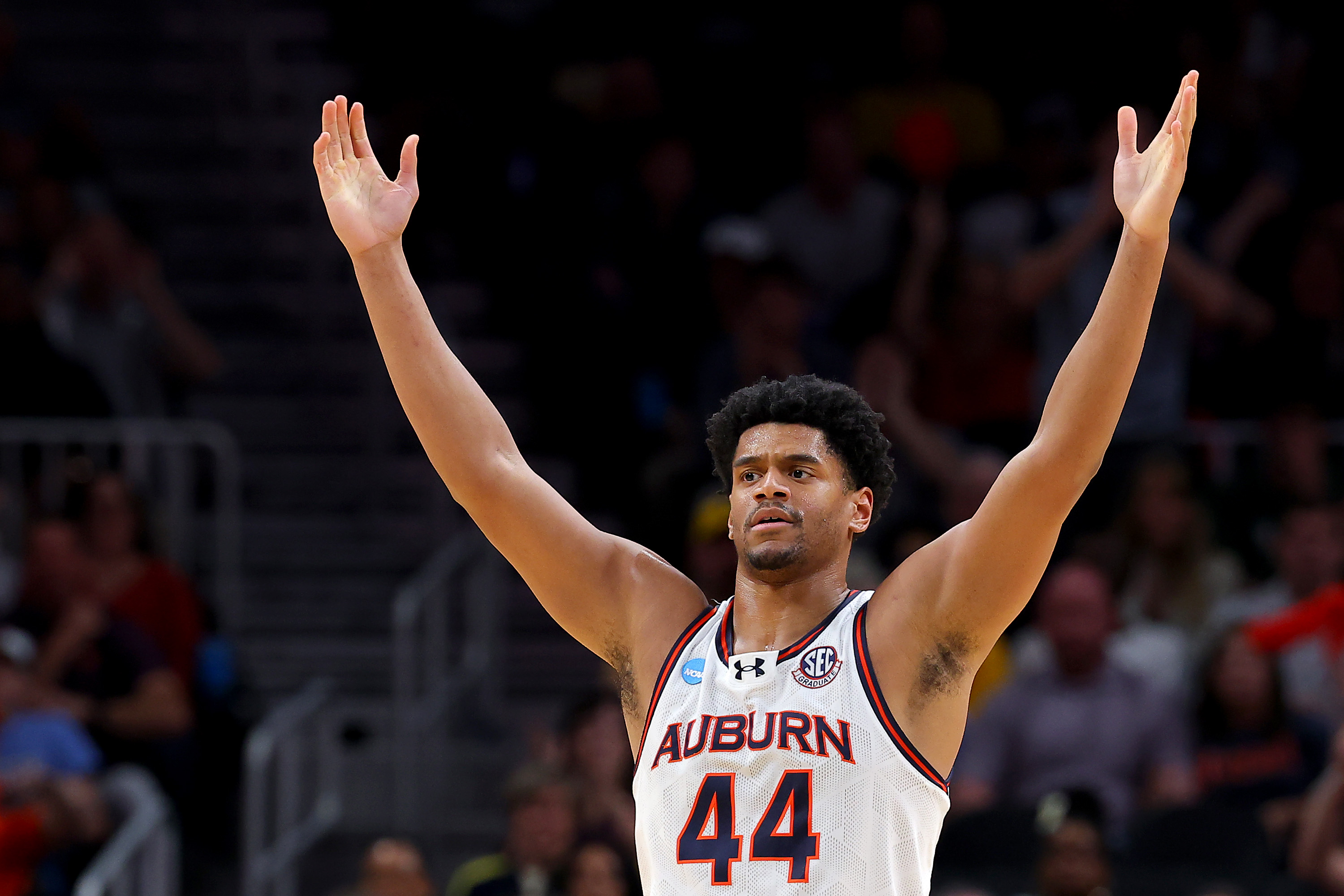 Dylan Cardwell #44 of the Auburn Tigers reacts during the second half against the Michigan Wolverines in the South Regional Sweet Sixteen round of the NCAA Men's Basketball Tournament on March 28, 2025