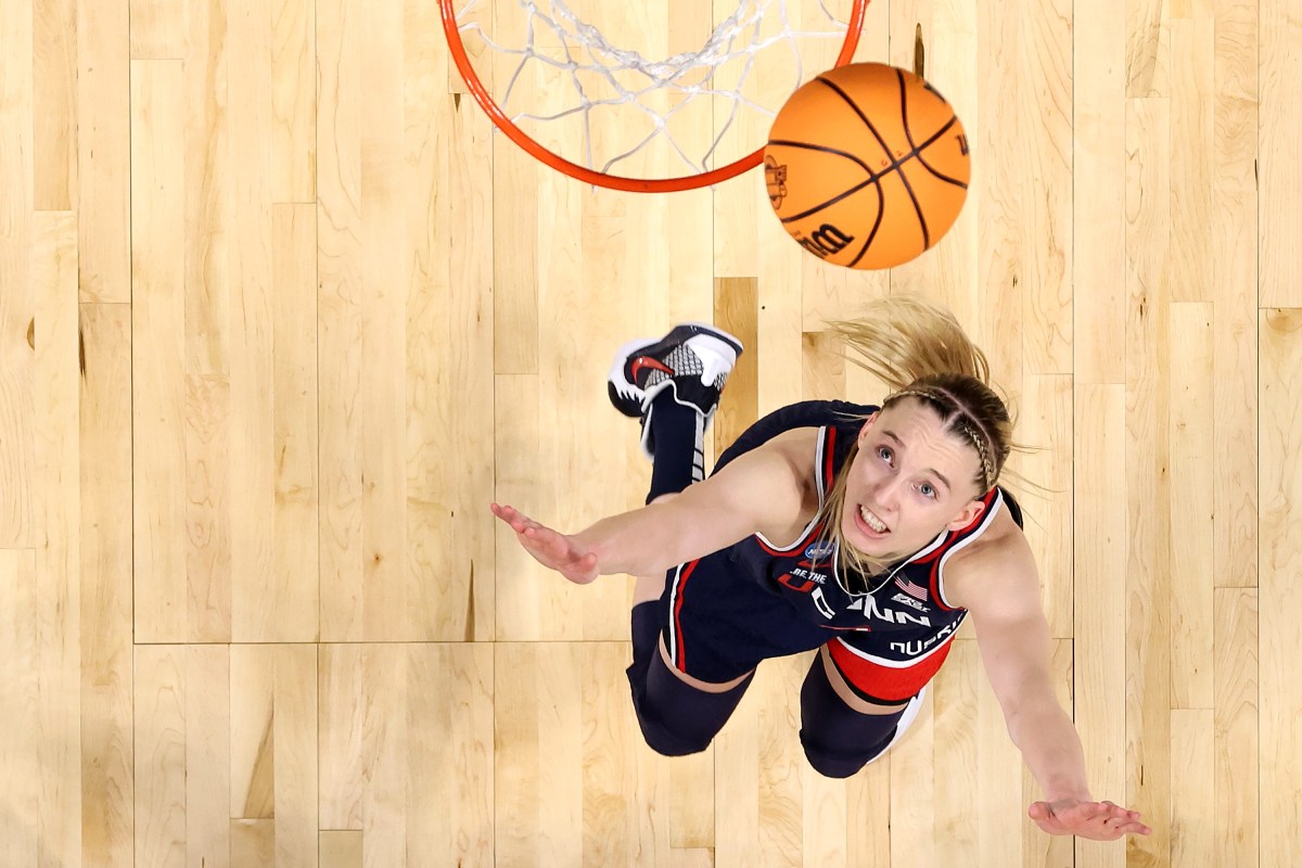 Paige Bueckers of the UConn Huskies watches a shot against the USC Trojans during the Elite Eight round of the NCAA Women's Basketball Tournament at Spokane Arena on March 31, 2025 in Spokane, Washington.