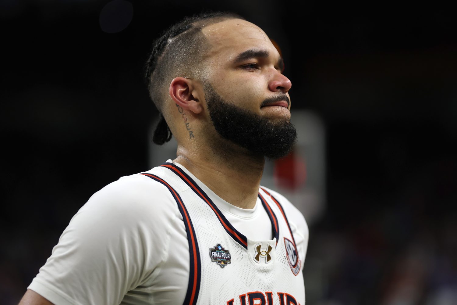 SAN ANTONIO, TEXAS - APRIL 05: Johni Broome #4 of the Auburn Tigers reacts after the second half in the Final Four game of the NCAA Men's Basketball Tournament against the Florida Gators at the Alamodome on April 05, 2025 in San Antonio, Texas. (Photo by Jamie Squire/Getty Images)