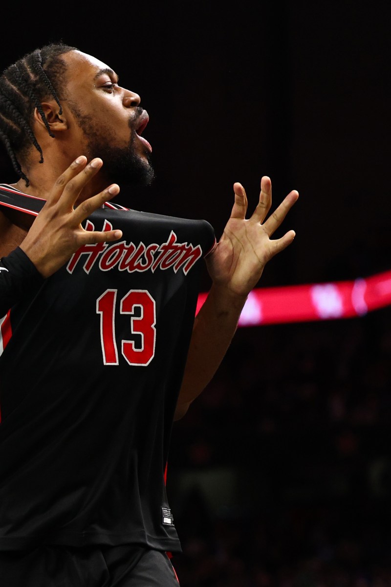 J'Wan Roberts #13 of the Houston Cougars celebrates in the Final Four Game of the NCAA Men's Basketball Tournament at Alamodome on April 05, 2025 in San Antonio, Texas