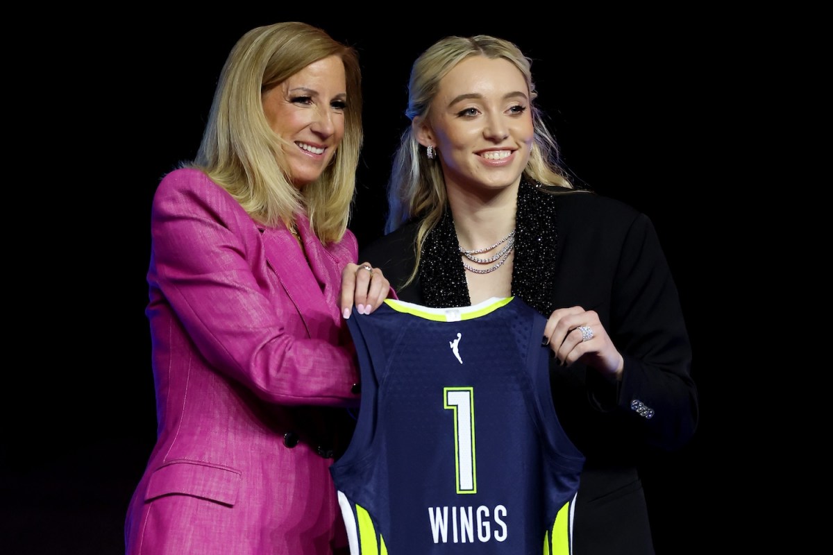 Paige Bueckers poses for a photo with WNBA Commissioner Cathy Engelbert