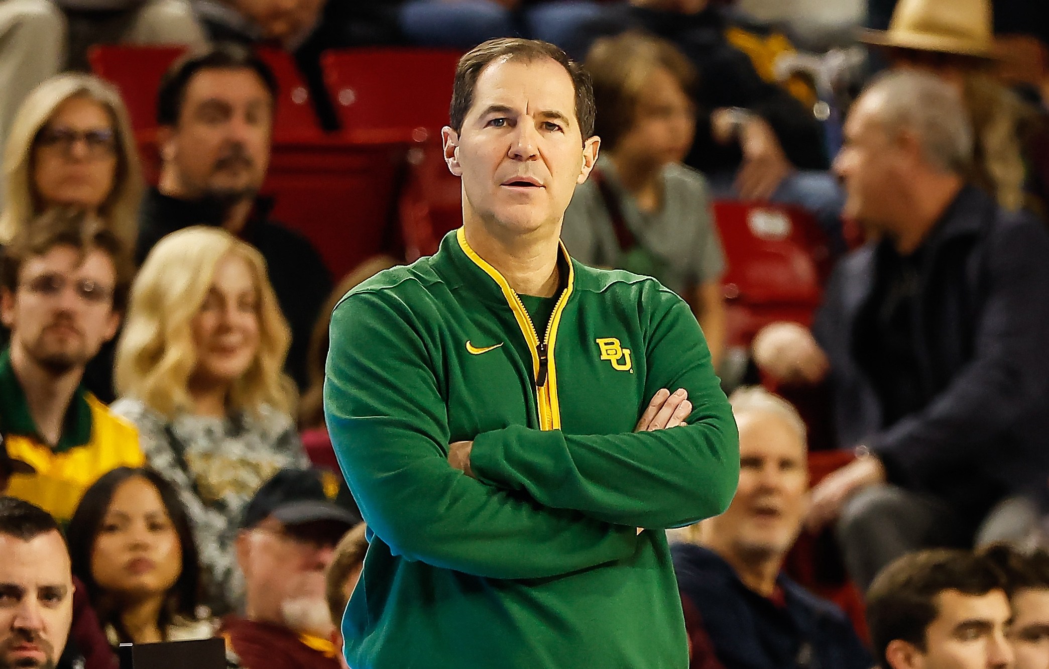 Scott Drew crosses his arms on Baylor's sideline