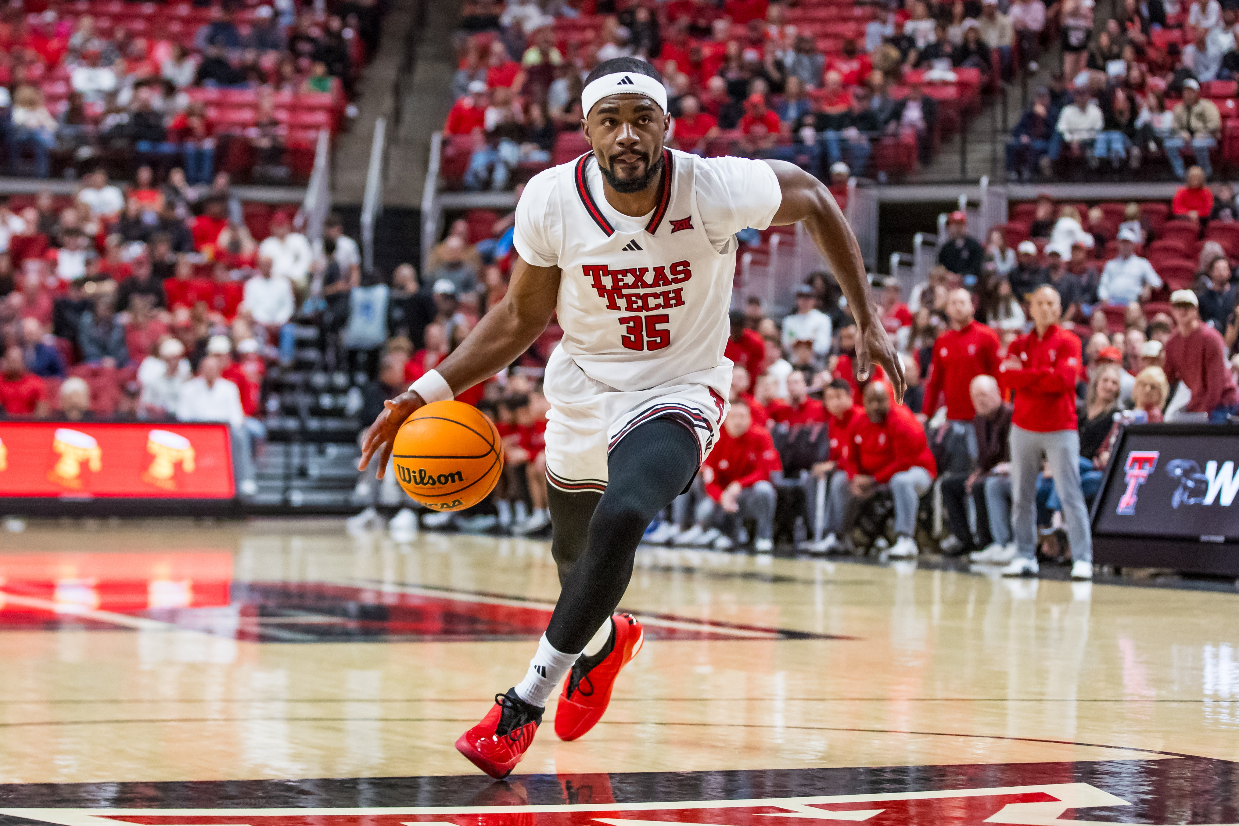 Devan Cambridge #35 of the Texas Tech Red Raiders handles the ball during the first half of the game against the Bethune-Cookman Wildcats at United Supermarkets Arena on November 05, 2024 in Lubbock, Texas. (Photo by John E. Moore III/Getty Images)