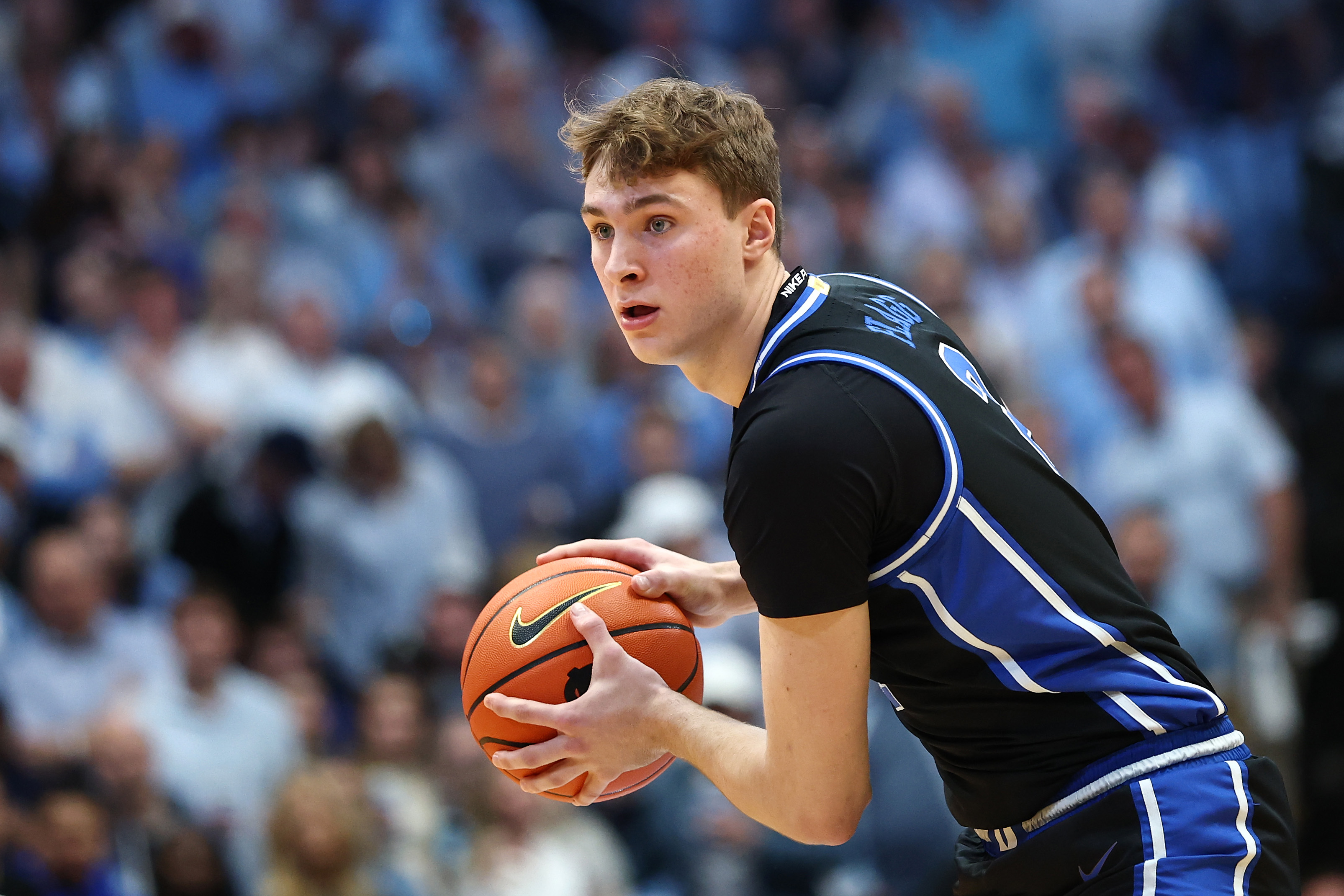 CHAPEL HILL, NORTH CAROLINA - MARCH 08: Cooper Flagg #2 of the Duke Blue Devils looks over the court during the first half of the game against the North Carolina Tar Heels at Dean E. Smith Center on March 08, 2025 in Chapel Hill, North Carolina. (Photo by Jared C. Tilton/Getty Images)