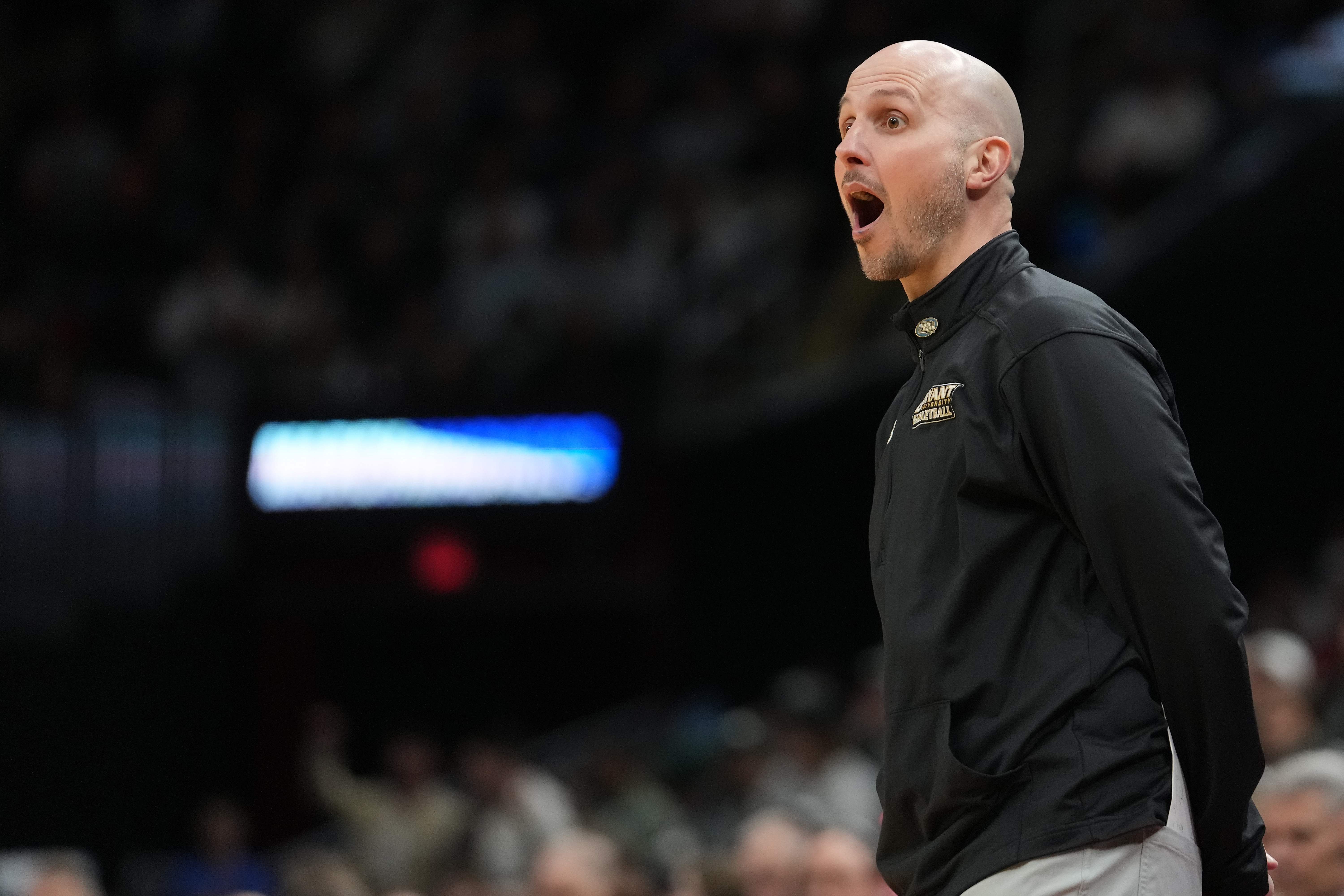 Bryant University head basketball coach Phil Martelli Jr. on the sidelines