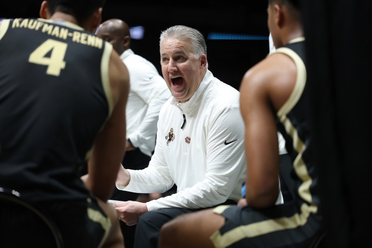Matt Painter in Purdue's huddle