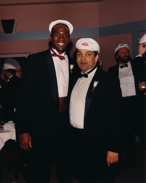 Photo of Michael Jordan and Sonny Vaccaro wearing tuxedos.