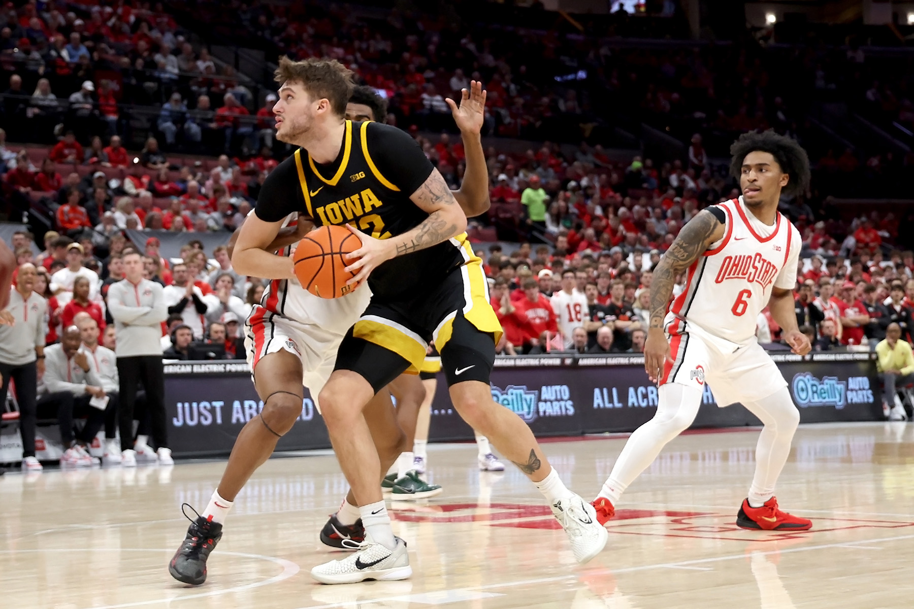 Iowa center Owen Freeman spins toward the basket during a game.