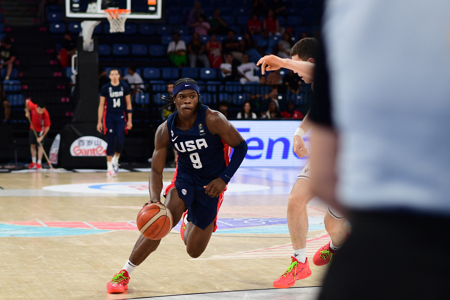 Jordan Smith Jr dribbles to the basket