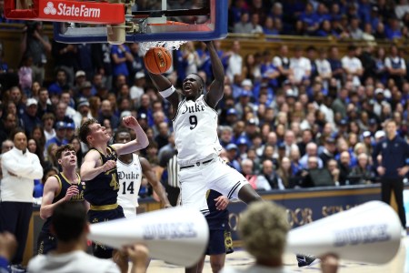 Khaman Maluach #9 of the Duke Blue Devils dunks the ball during the first half of the game against the Notre Dame Fighting Irish