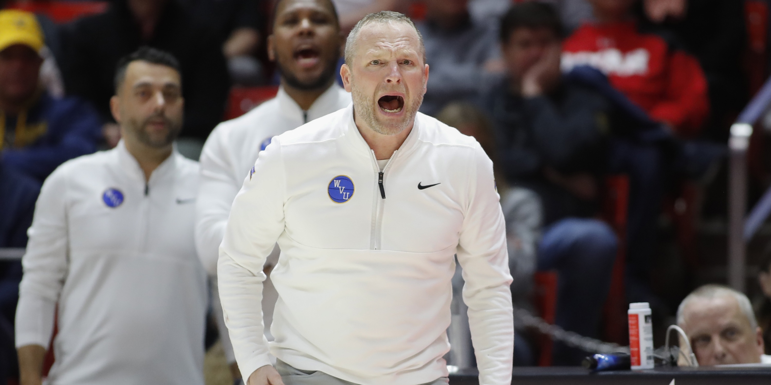 After five years with the Drake Bulldogs, Darian DeVries spent a single season at West Virginia's helm. Now he's taking his son Tucker with him to Indiana.