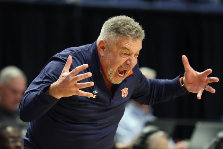 Auburn basketball coach Bruce Pearl is animated on the sidelines