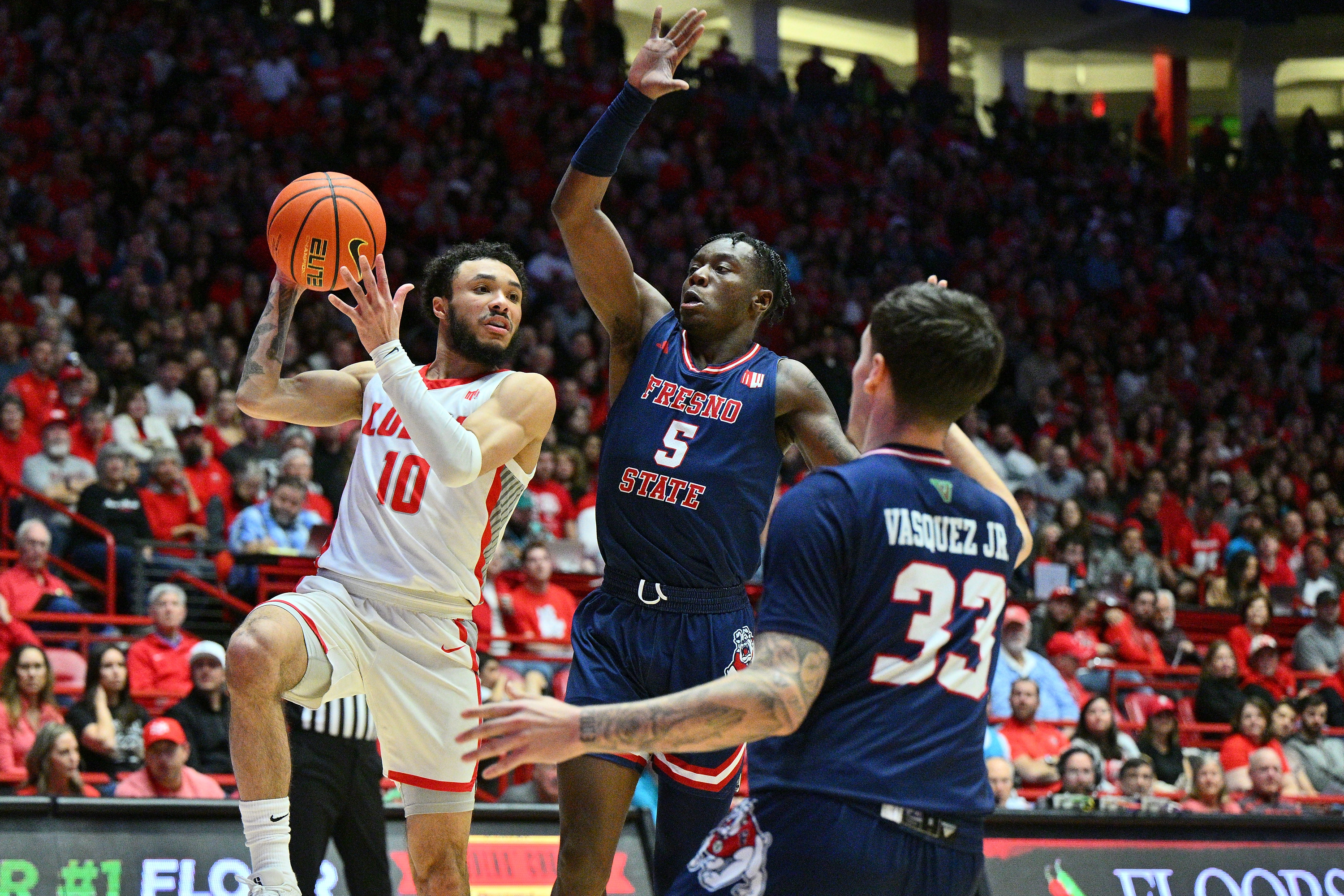 Mykell Robinson dropped points and adjusted his stats so former teammates Steven Vasquez (right) and Jalen Weaver (center) could cash in