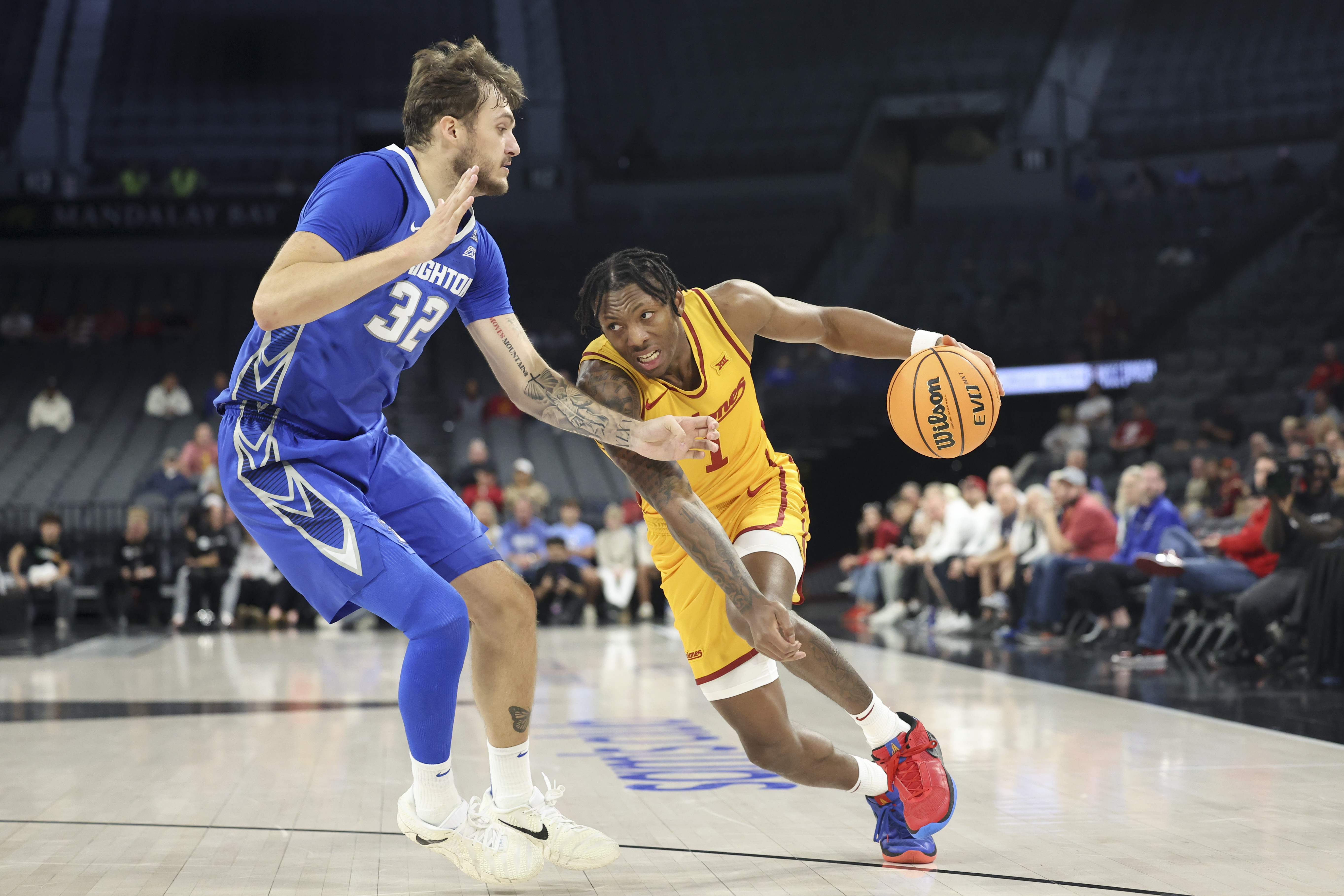 Creighton's Owen Freeman defending Iowa State's Jamarion Batemon