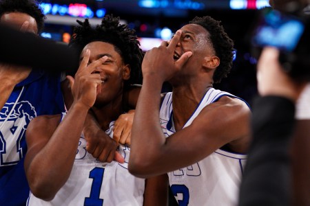 AJ Dybantsa celebrates with Robert Wright III after the first three-point buzzer beater of Wright's career
