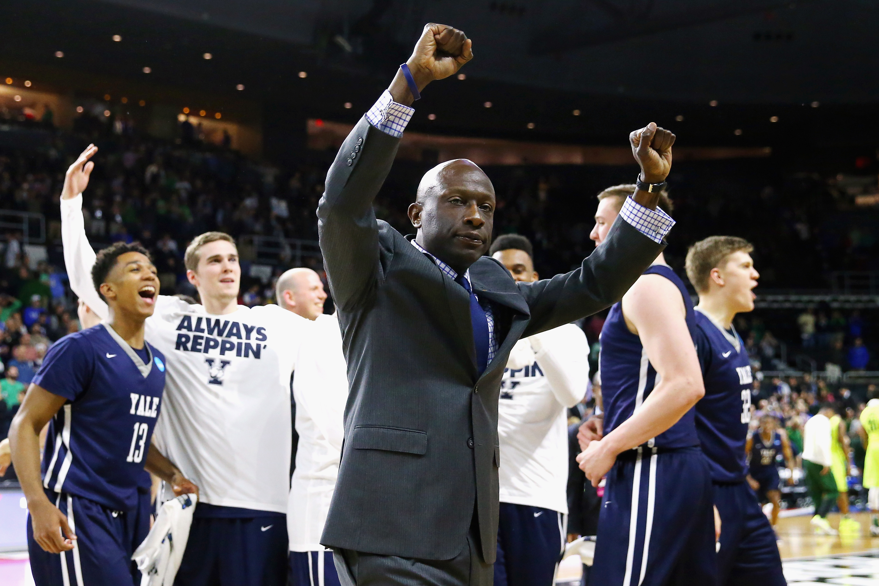 Jones celebrating with his team after shocking Baylor in the first round of the 2016 NCAA Tournament