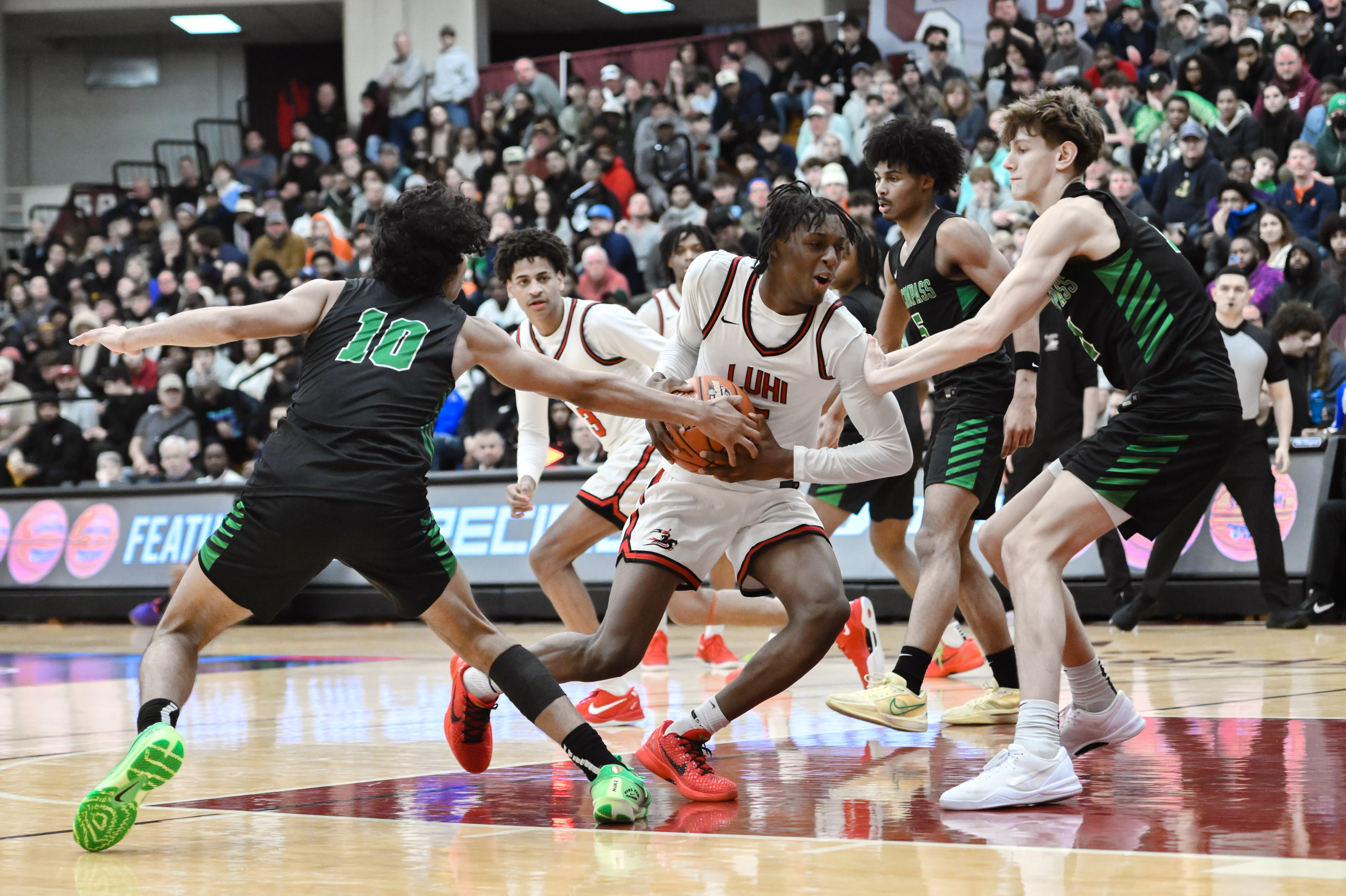 UNC commit Dylan Mingo driving to the basket for Long Island Lutheran at the 2025 Hoophall Classic in Springfield, Mass.