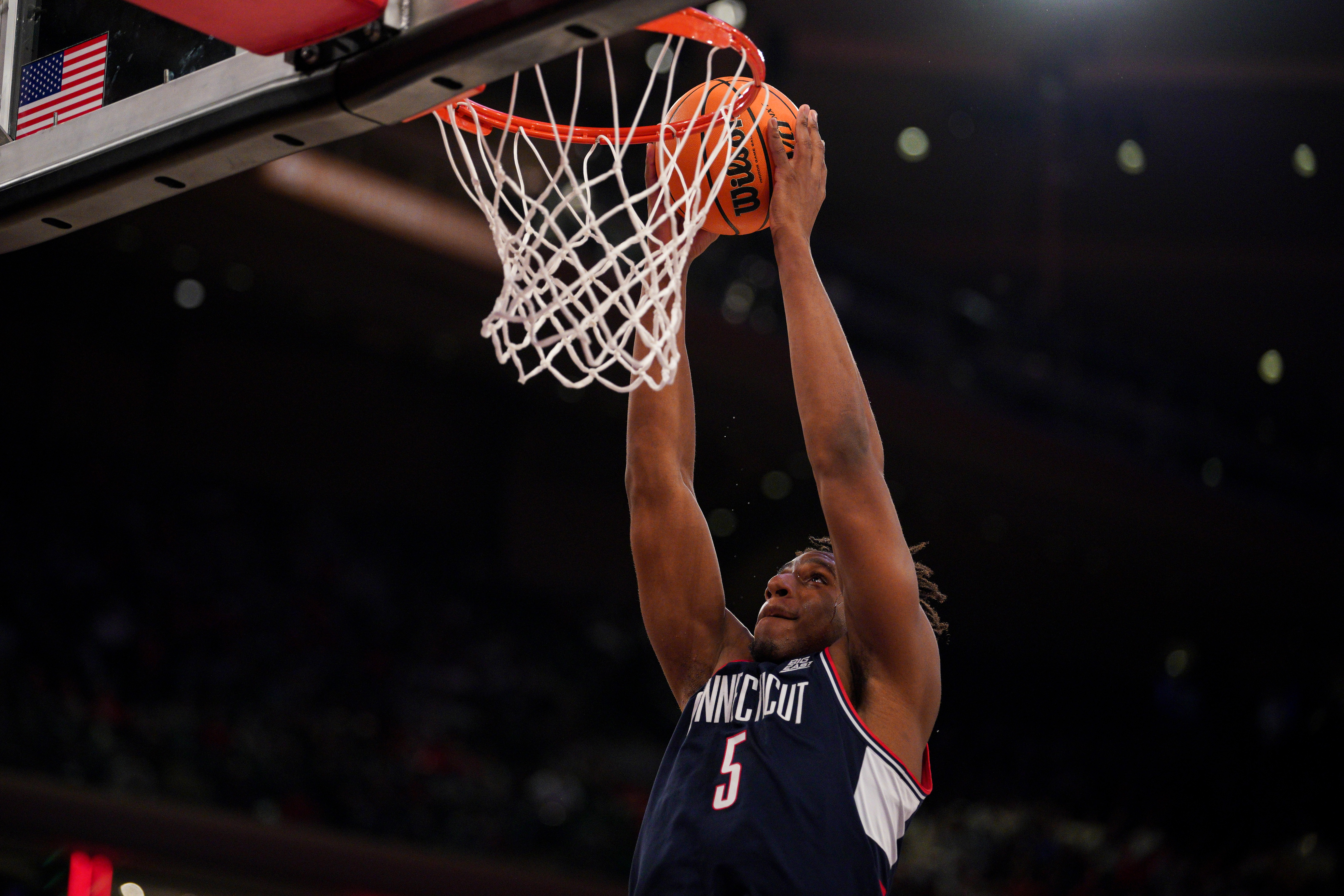 UConn's Tarris Reed helped the Huskies rebound from the loss to St. John's, as he finished two assists shy of a triple-double in a road win over Butler