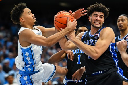 UNC's Seth Trimble, who hit the game-winning three-pointer over Duke, battles Cameron Boozer for a loose ball