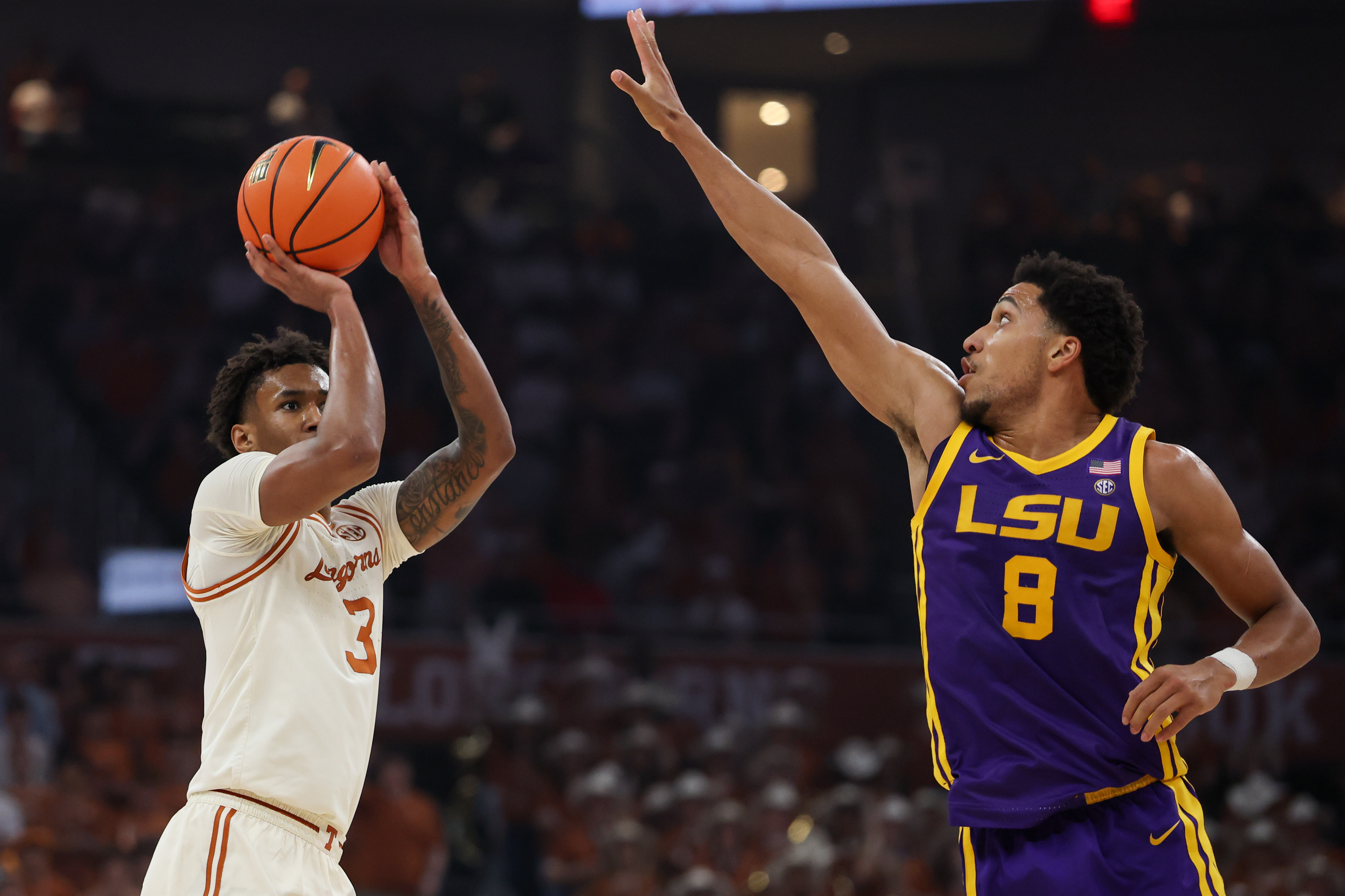 Dailyn Swain shooting over LSU's Pablo Tamba during the Longhorns' home win over the Tigers on Feb. 17
