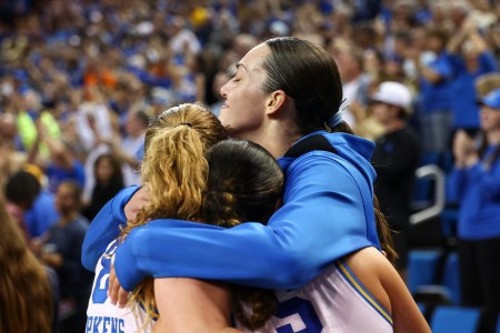 UCLA's Angela Dugalić embraces teammate Gianna Kneepkens