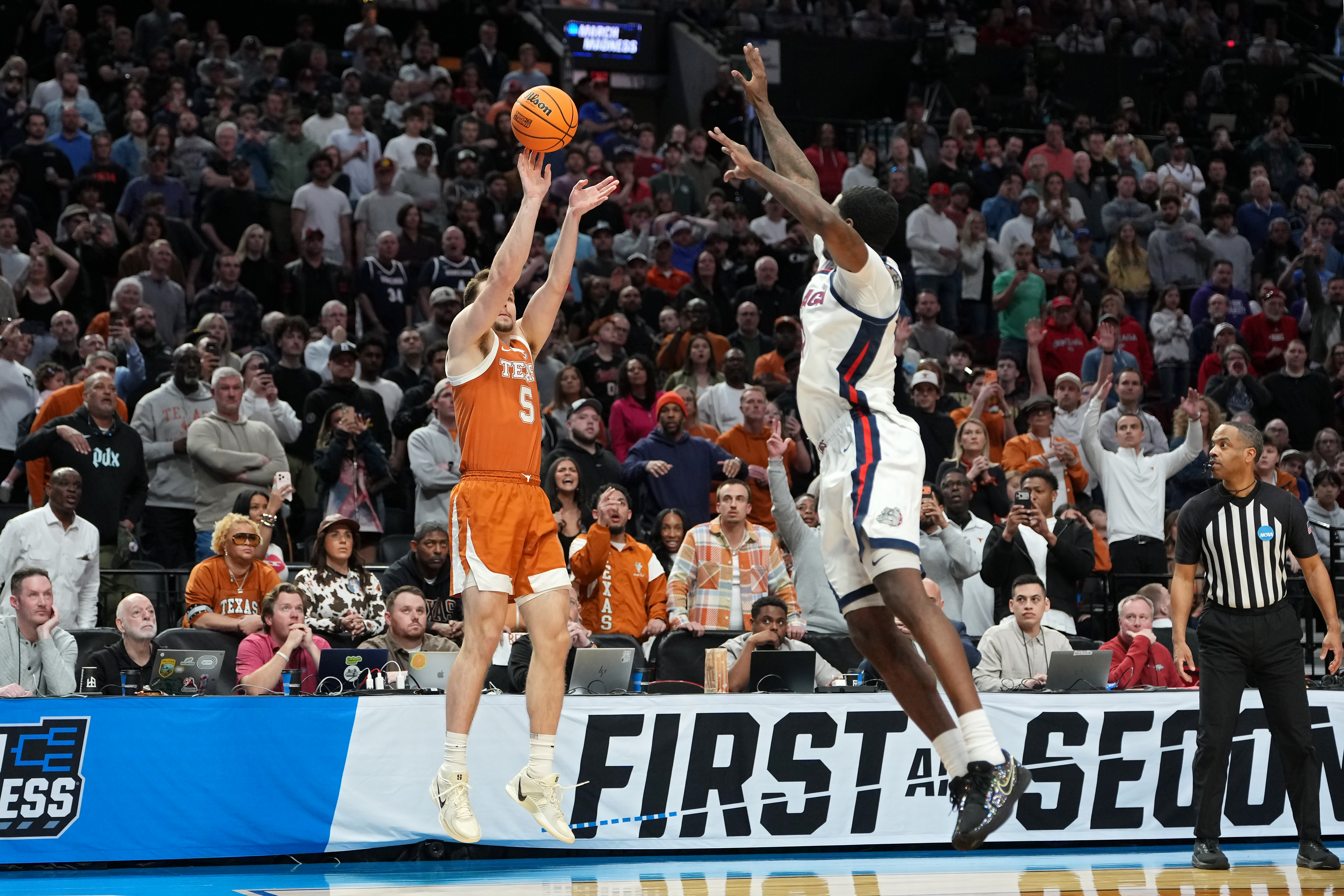 Camden Heide's only bucket Saturday night was the one that sent Texas to the Sweet 16
