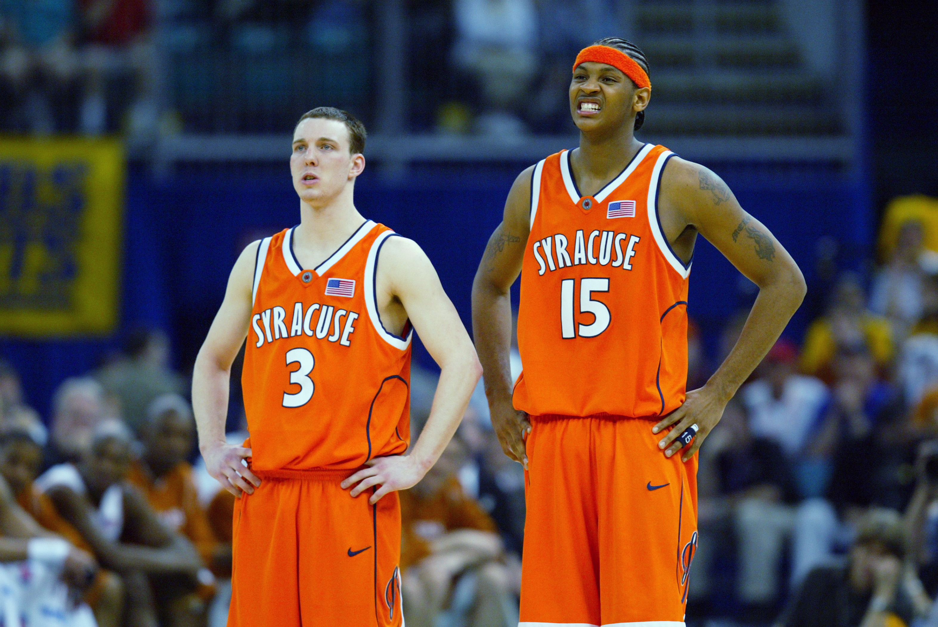 Gerry McNamara #3 of the Syracuse University Orangeman stands next to his teammate Carmelo Anthony #15 during the semifinal round of the NCAA Final Four Tournament on April 5, 2003.