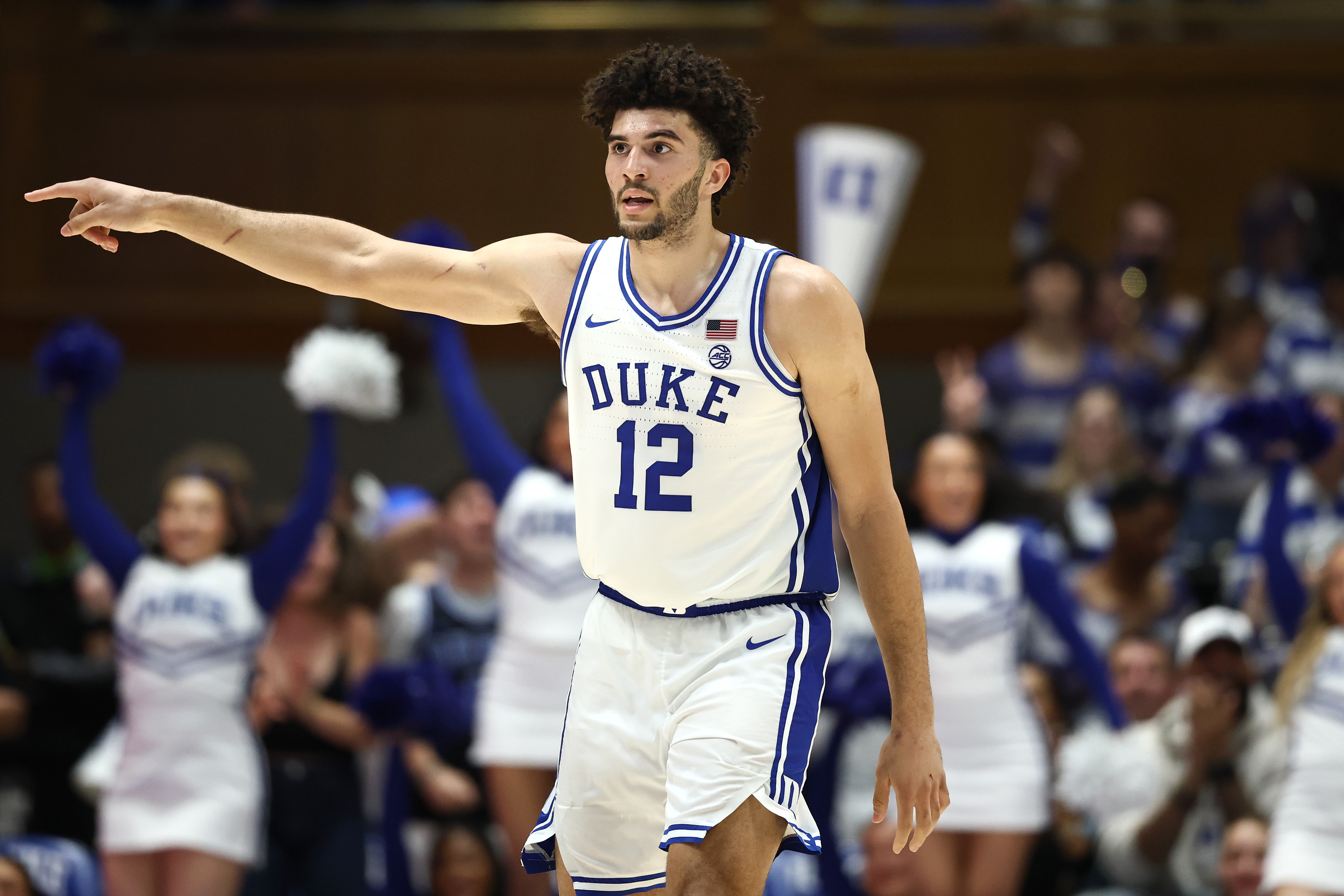 Duke freshman Cameron Boozer points to a teammate on the court