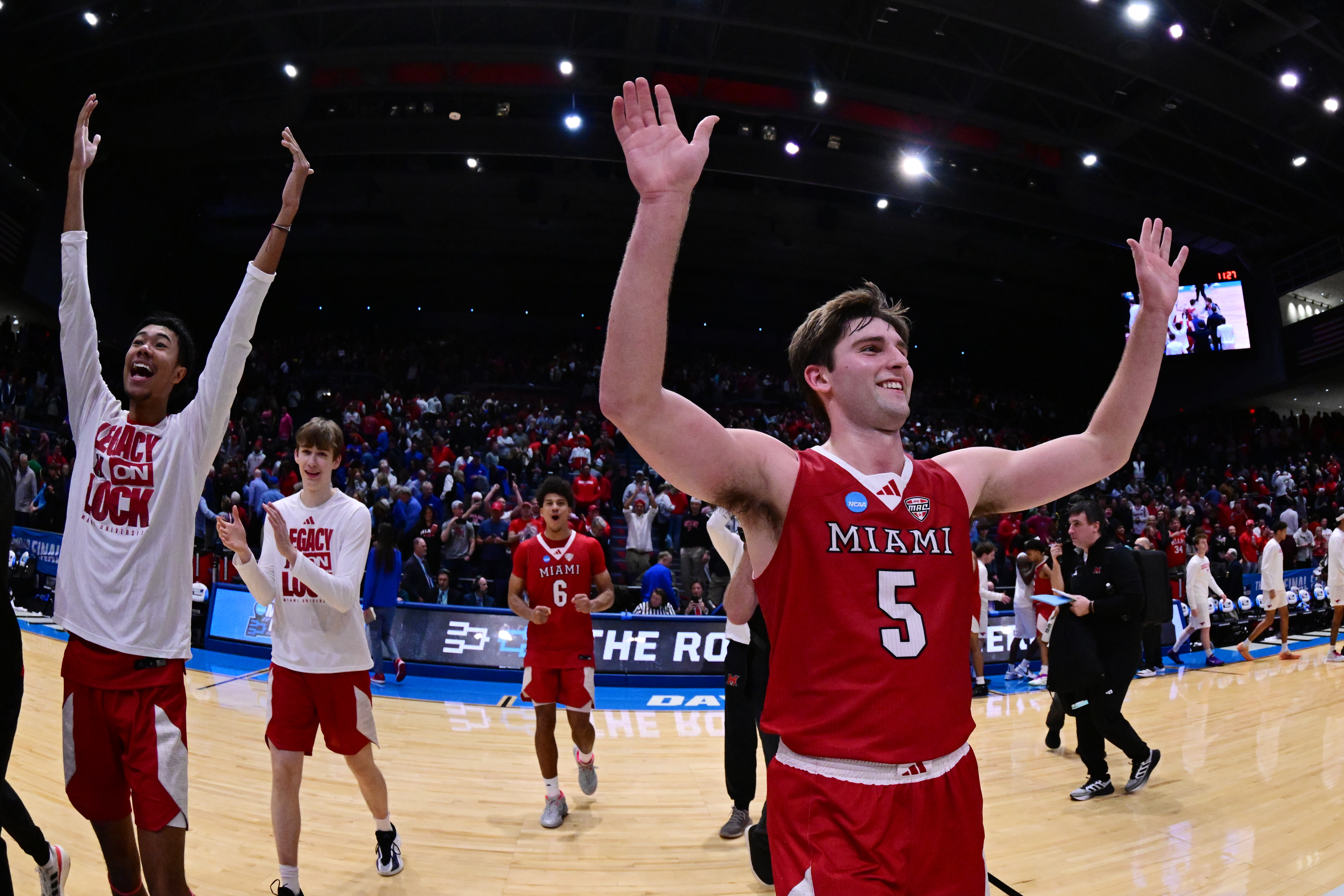 Peter Suder (#5) celebrates with his teammates after taking down the Mustangs