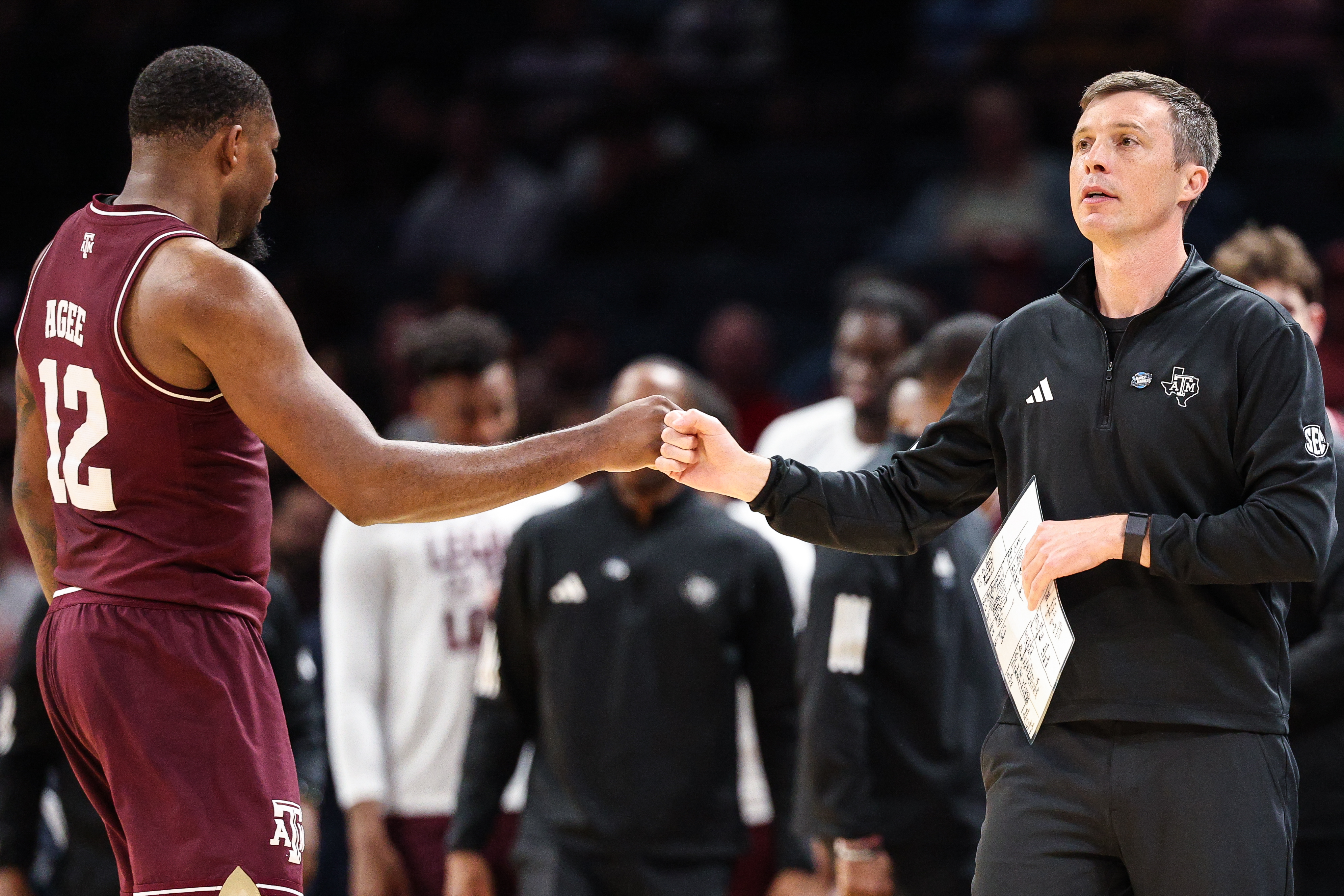 McMillan and leading scorer Rashaun Agee bump fists during A&M's first-round win over St. Mary's