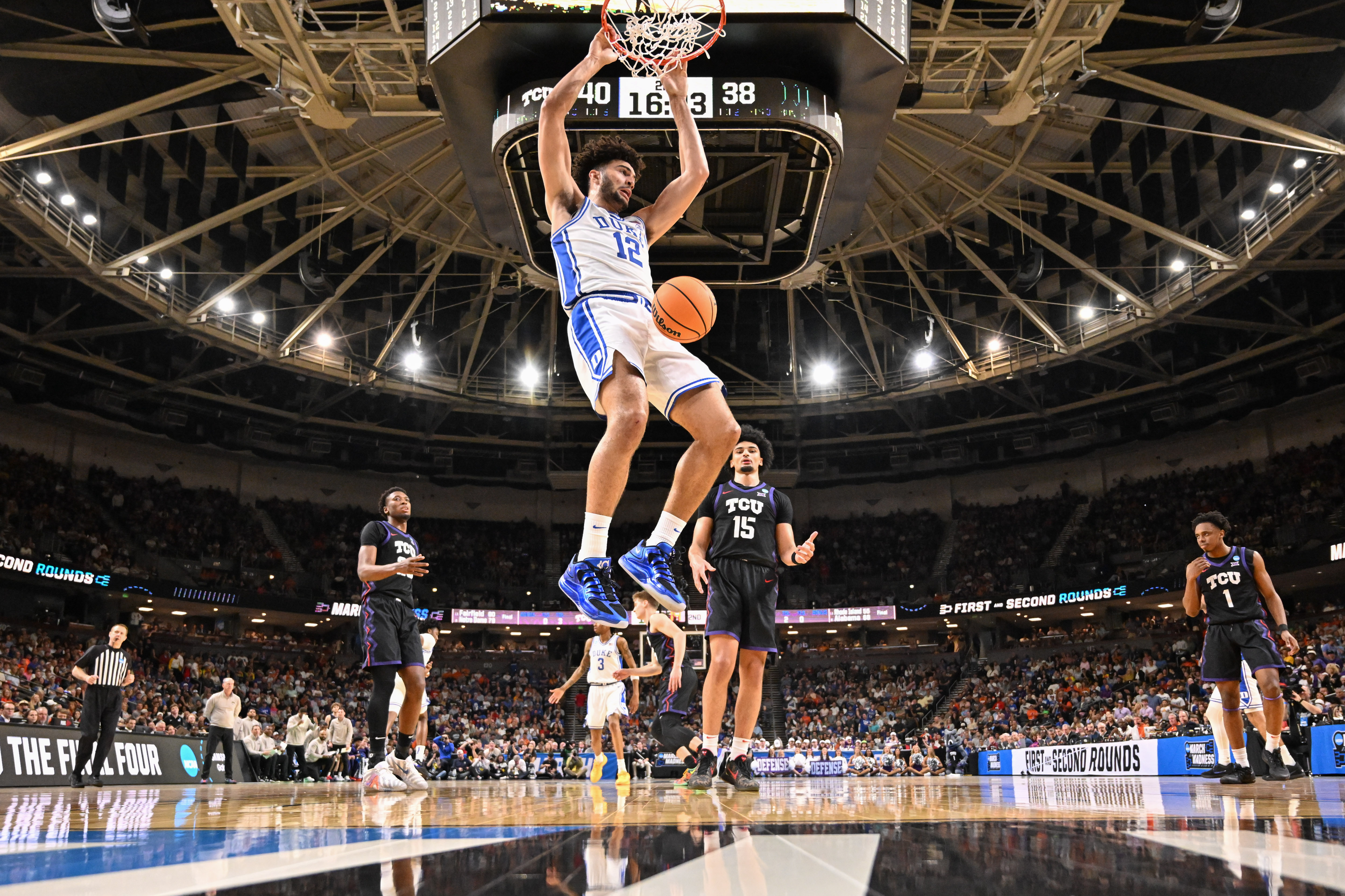 Cameron Boozer #12 of the Duke Blue Devils dunks during the second round of the 2026 NCAA Men's Basketball Tournament