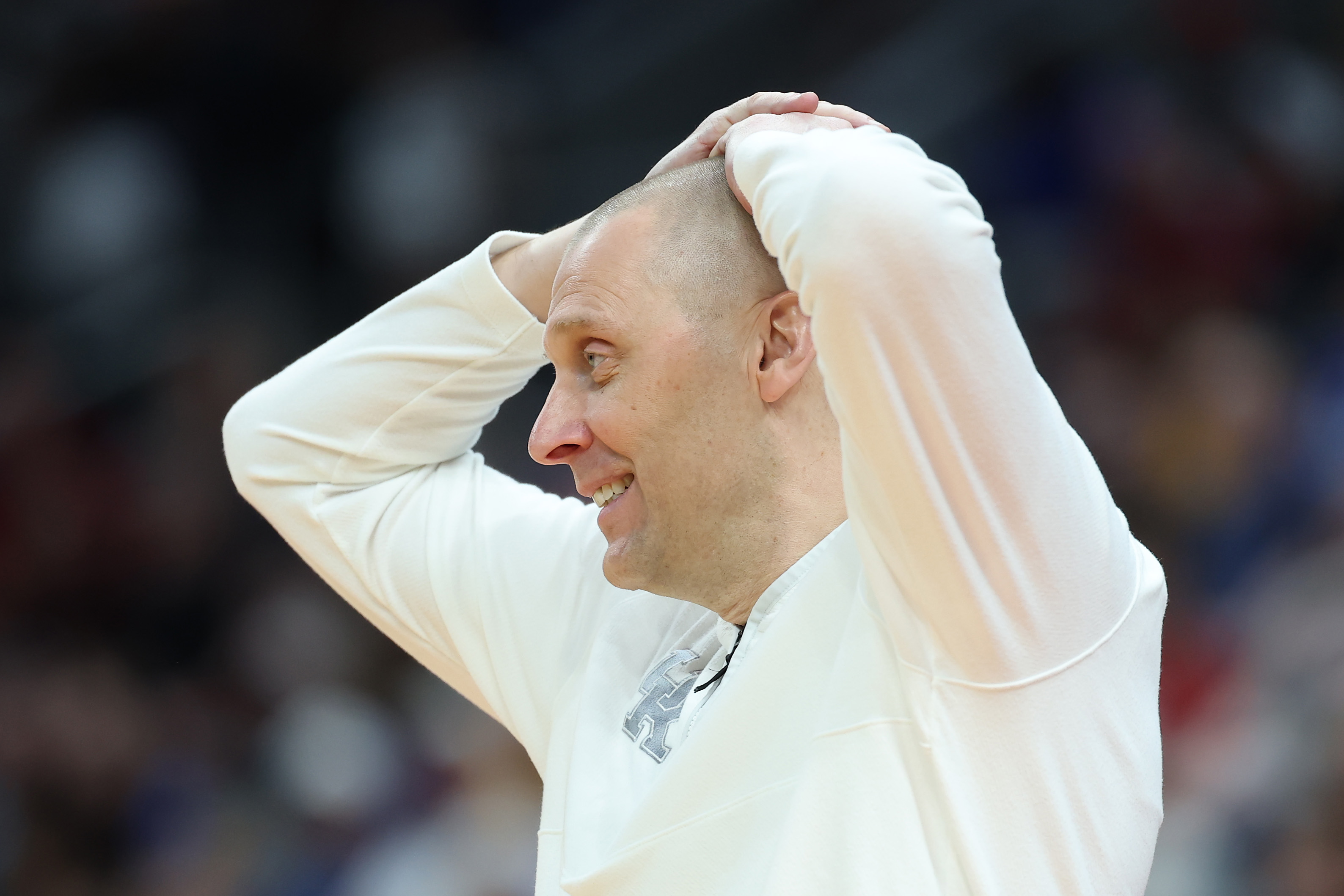 Kentucky basketball coach Mark Pope reacts with pure joy after his team's win