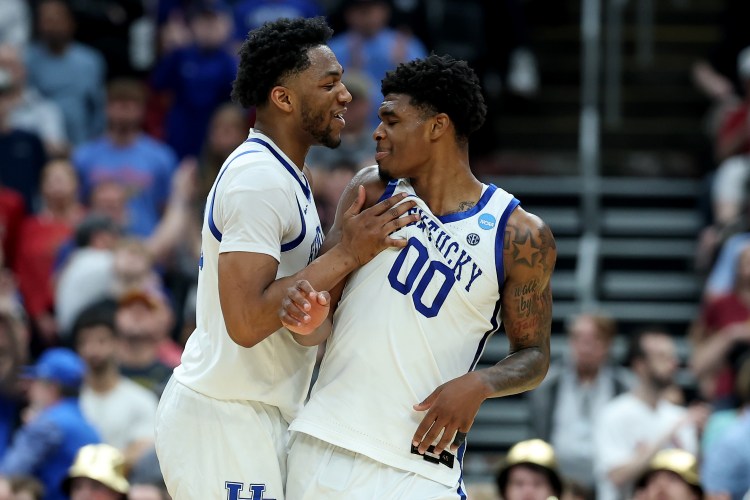 Mouhamed Dioubate and Otega Oweh of the Kentucky Wildcats celebrate