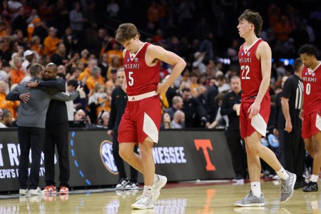 Peter Suder (#5) and Brant Byers (#22) walk off the court following the Redhawks' season-ending loss to Tennessee