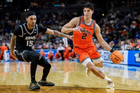 Andrej Stojakovic of the Illinois Fighting Illini brings the ball up court