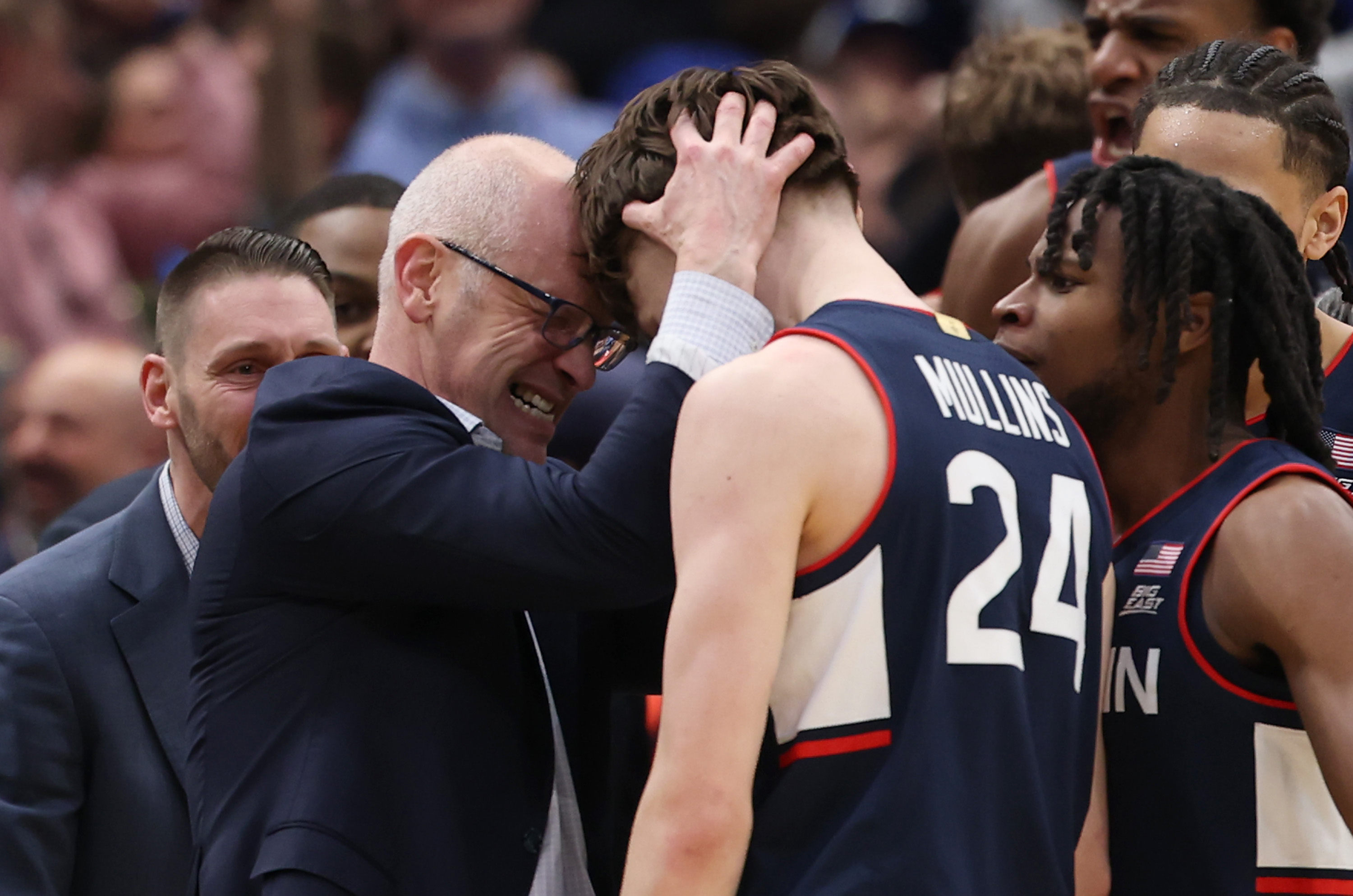 UConn basketball coach Dan Hurley embraces Braylon Mullins after the player nailed the game winning shot