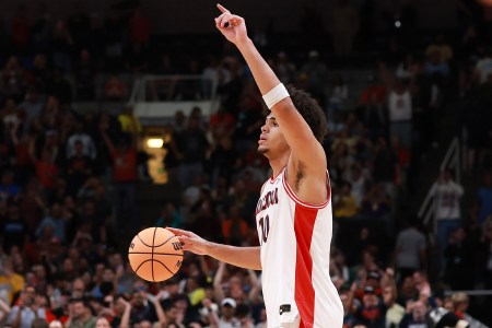 Koa Peat dribbles up the court