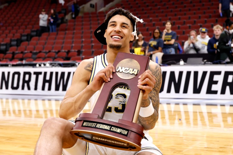 U. of Michigan basketball player Yaxel Lendeborg celebrates his team's win in the 2026 NCAA Midwest Region final