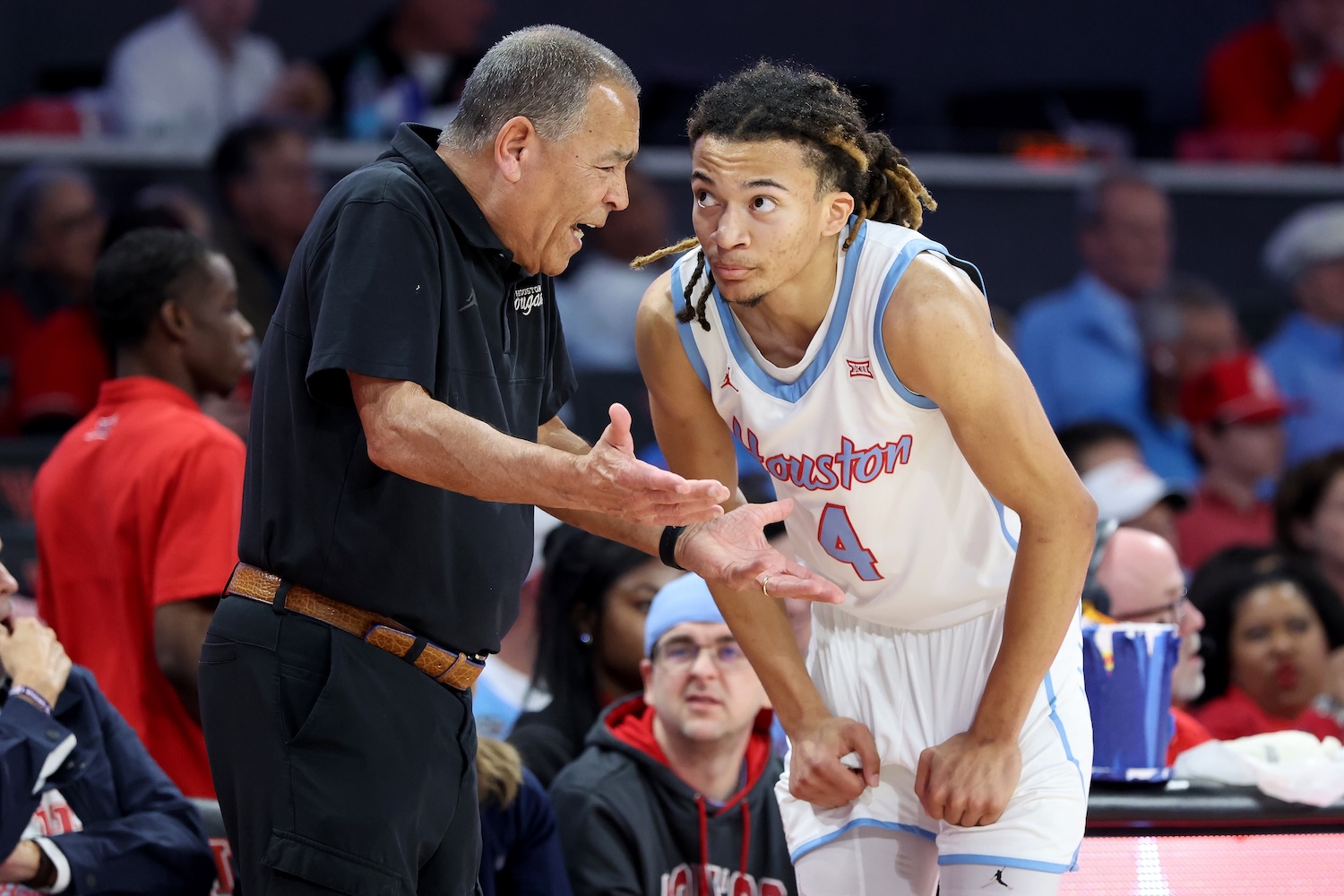 Head coach Kelvin Sampson of the Houston Cougars talks with Kingston Flemings