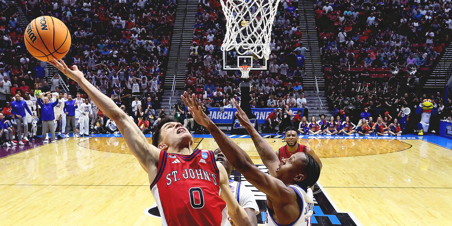 St. John's Dylan Darling hits the game-winning layup as time expires.