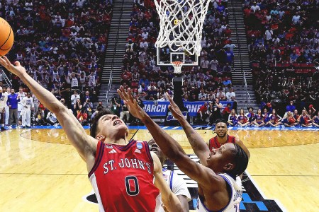 St. John's Dylan Darling hits the game-winning layup as time expires.