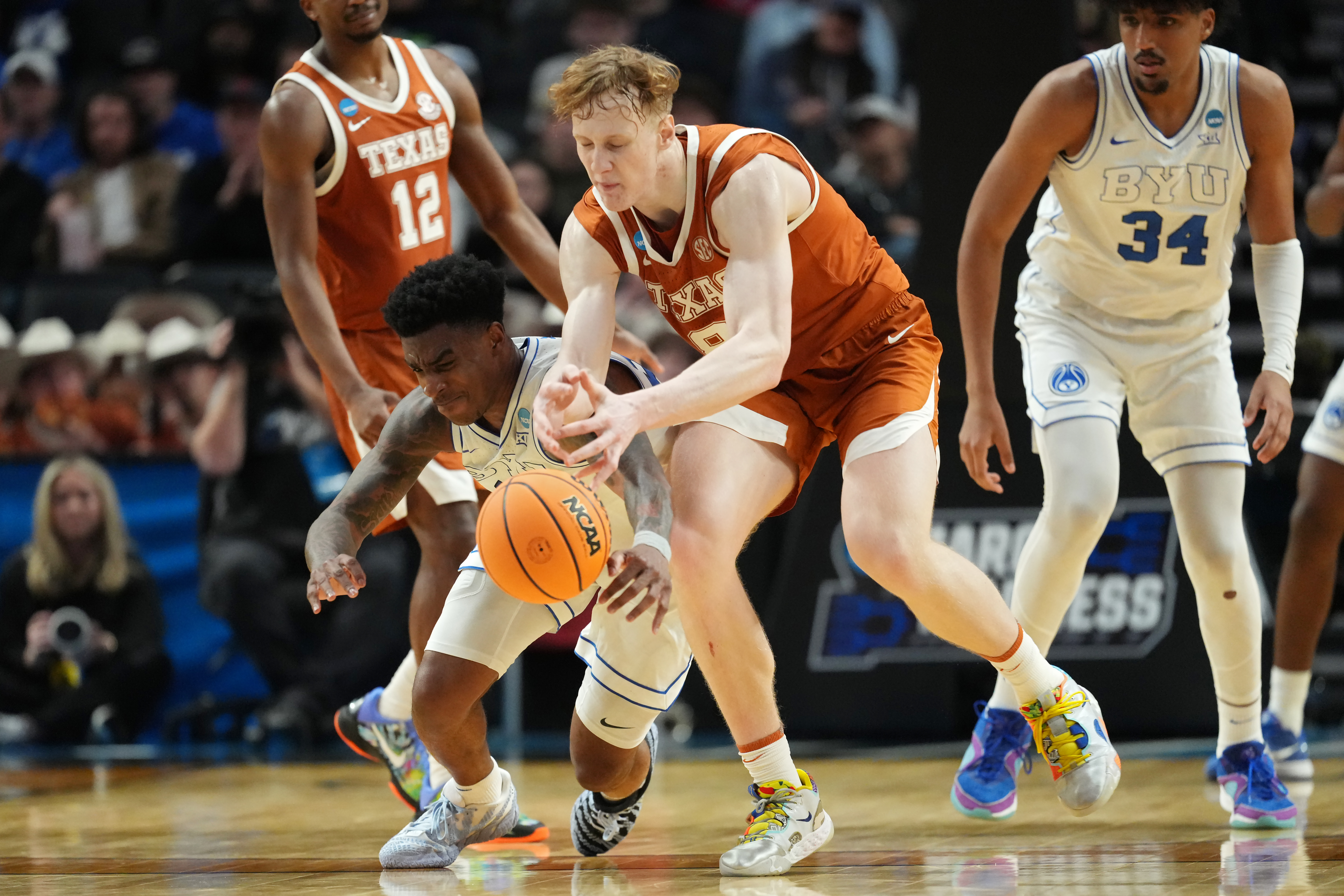 Texas' win was sealed with a breakaway layup by 7-foot sophomore center Matas Vokietaitis